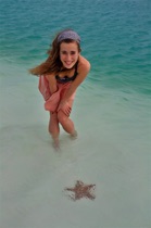 Starfish with my daughter, Cayo Largo del Sur, by marcorossimusic
