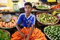 Busy guy, Central Market, Port Louis, Mauritius, by marcorossimusic