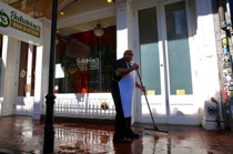 Washing in front of my club, New Orleans, by marcorossimusic