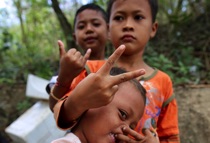 Boys play bullying, Bali, by marcorossimusic