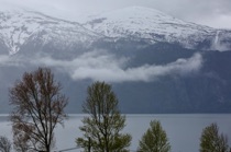 A family watches the Sognefjord, Norway, by marcorossimusic