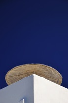 Umbrella, Santorini, Greece, by marcorossimusic